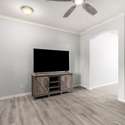 Use this versatile space as a second living room, media area, or home office. Clean lines, fresh paint, and sleek flooring make it both move-in ready and design-friendly.