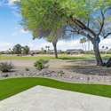 Professionally landscaped with desert plants and lush turf, this backyard offers expansive golf course views, perfect for morning coffee or peaceful sunsets.