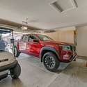 Roomy enough for vehicles and your golf cart, this two-car garage features added storage cabinetry perfect for active lifestyles in beautiful Surprise, AZ.