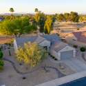 Nestled along the golf course in Surprise, this updated home boasts manicured desert landscaping and mature trees. Enjoy the peaceful ambiance and scenic views from this beautifully positioned lot.