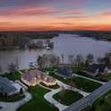 Exterior twilight drone photo of 846 Armstrong Dr showing prime waterfront location on Lake Wylie
