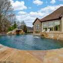 Exterior Day Time Photo - 846 Armstrong Rd - Additional Photo of Pool, facing house. Also pictured, overflow waterfall Hot Tub and Grotto
