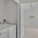 Hall Washer Dryer closet off the Living room.