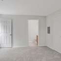 Primary Bedroom view of closet and bath.