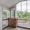 Screened-in Porch view into the Sunroom.