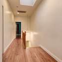 View of upstairs hall from bedroom 3.