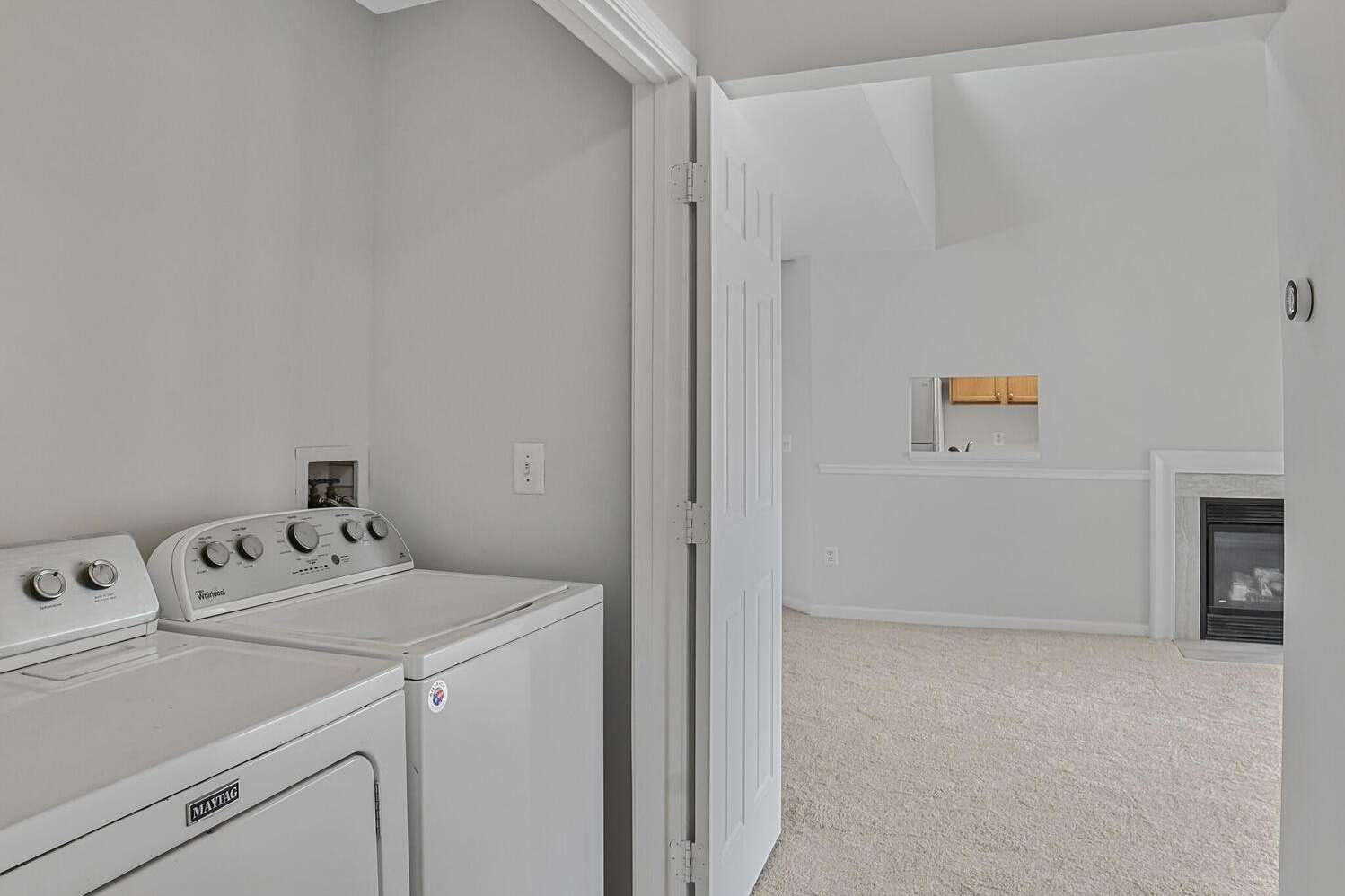 22 of 34. Hall Washer Dryer closet off the Living room.