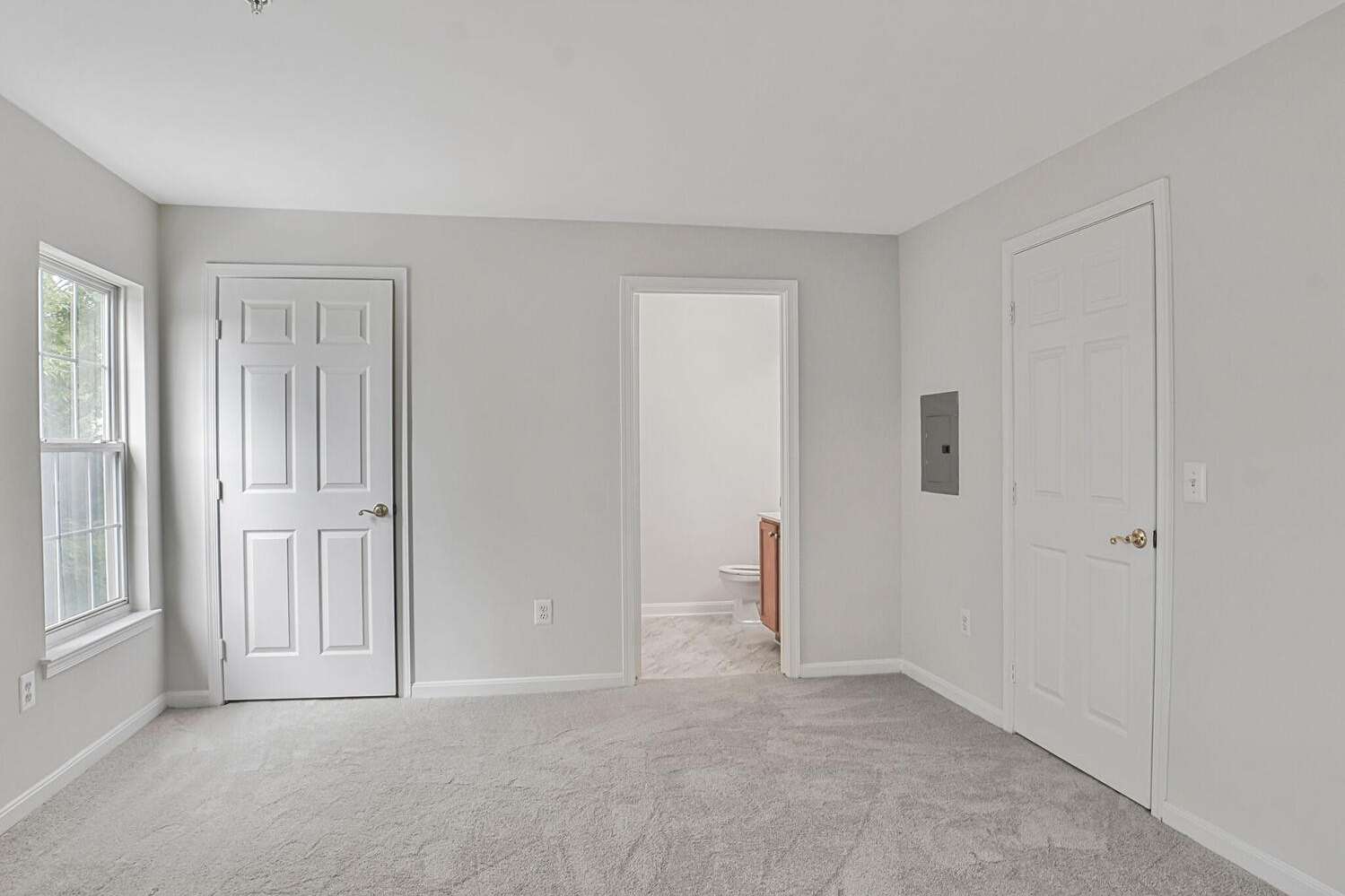 27 of 34. Primary Bedroom view of closet and bath.