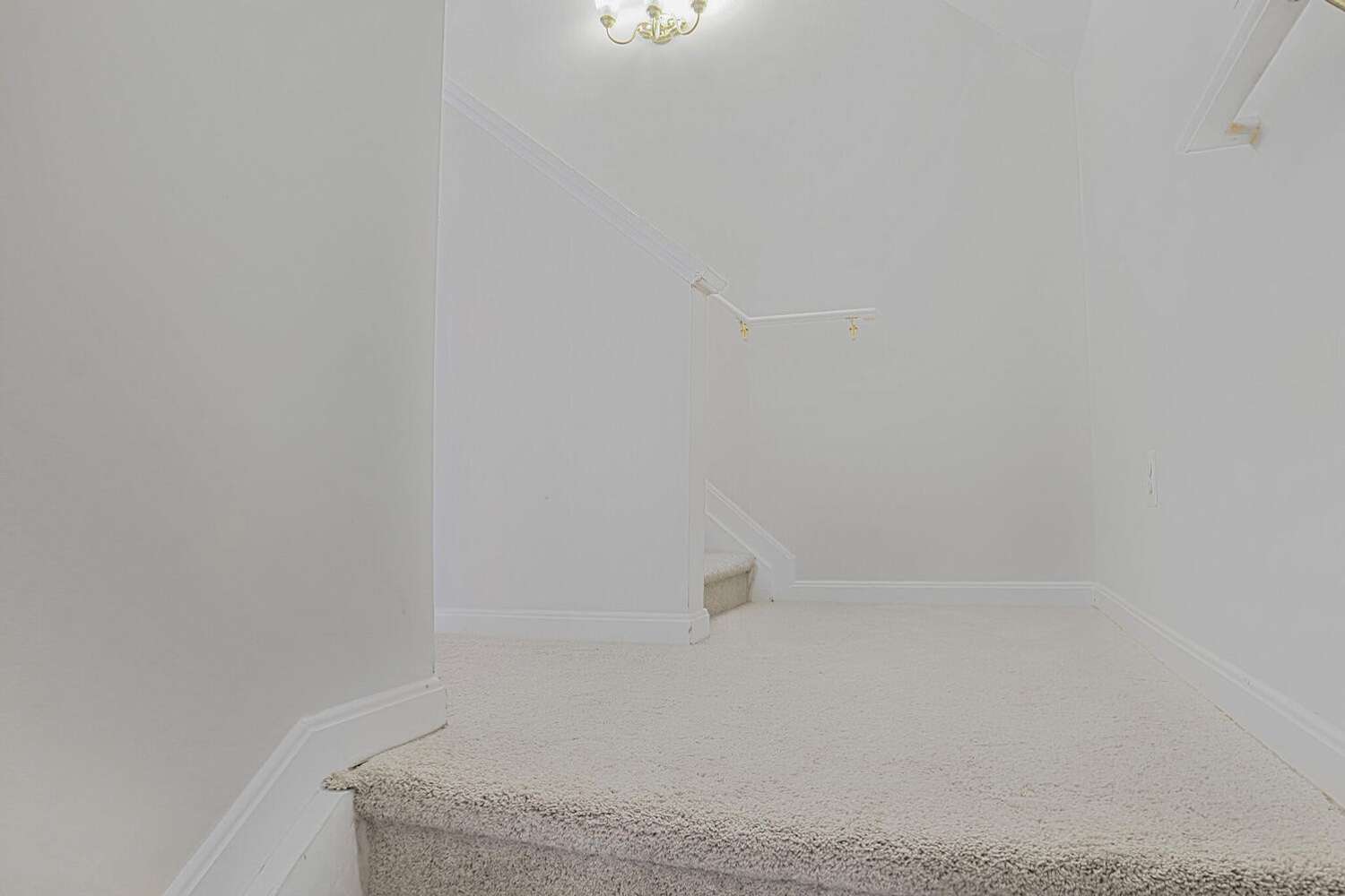 4 of 34. Landing at the top of the stairs leading to the hall, the stairs to the right lead you to the bonus loft space.