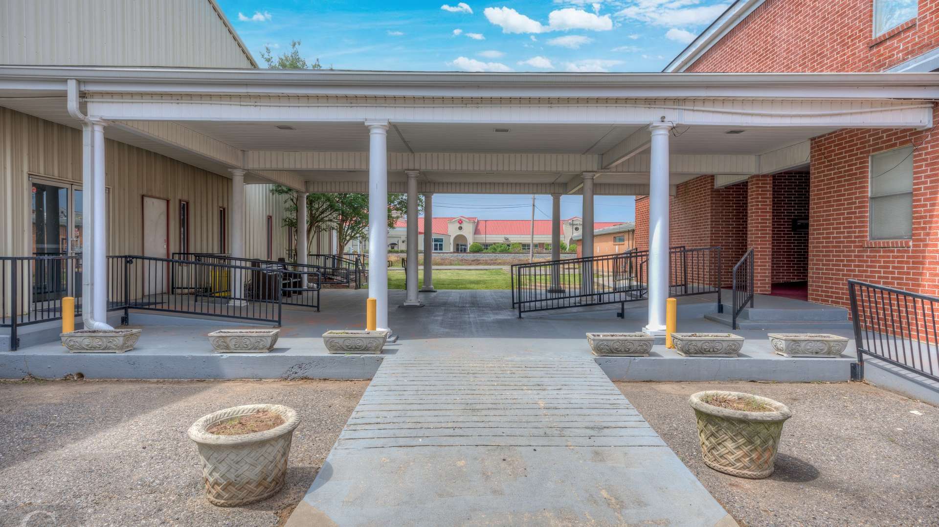 14 of 70. covered walkway from Church building to gym