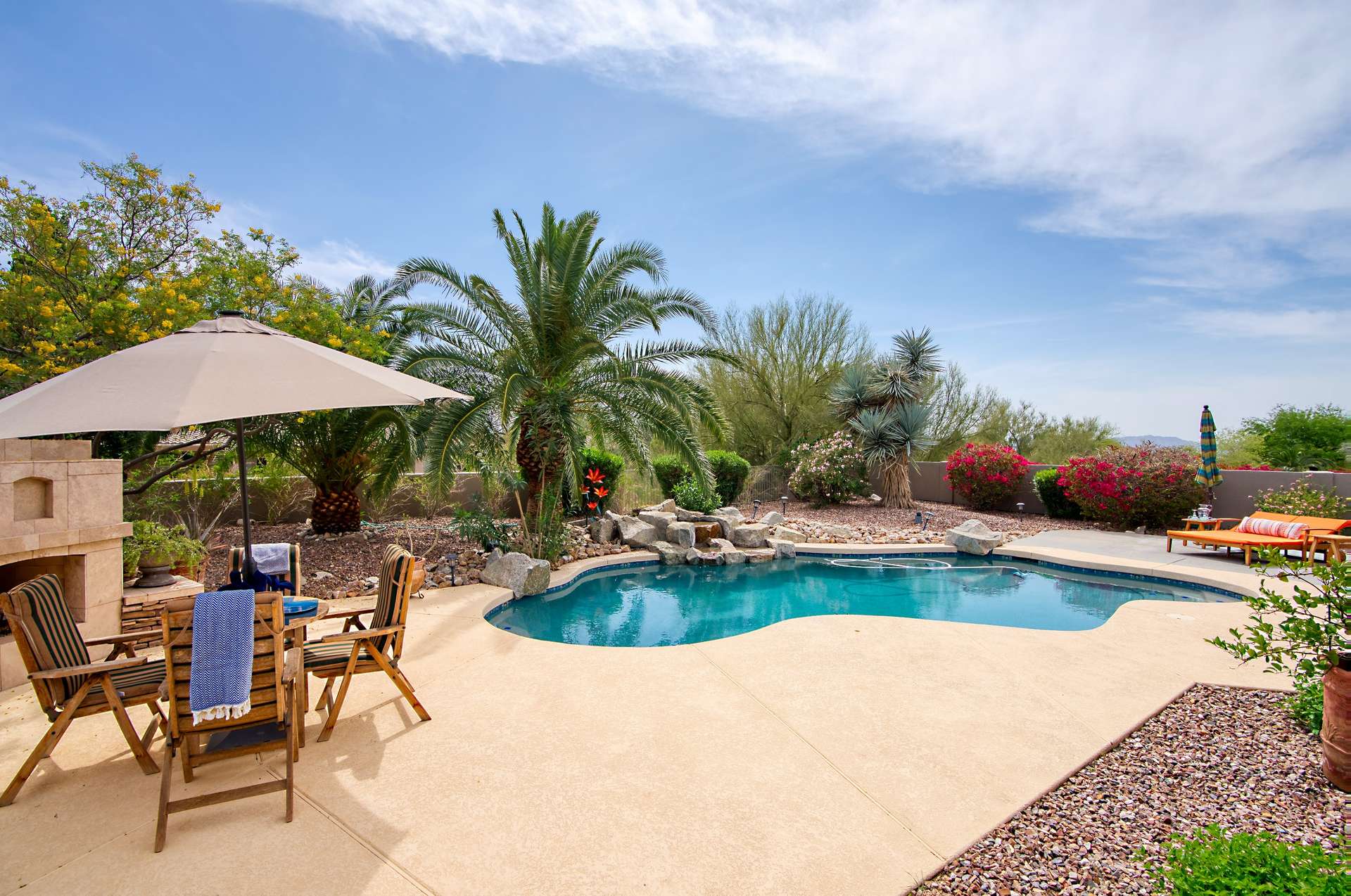 5 of 65. Host unforgettable gatherings with a built-in BBQ, shaded dining, and resurfaced pool. Surrounded by colorful plants and privacy landscaping, this backyard offers an upscale escape just minutes from Scottsdale s best amenities.