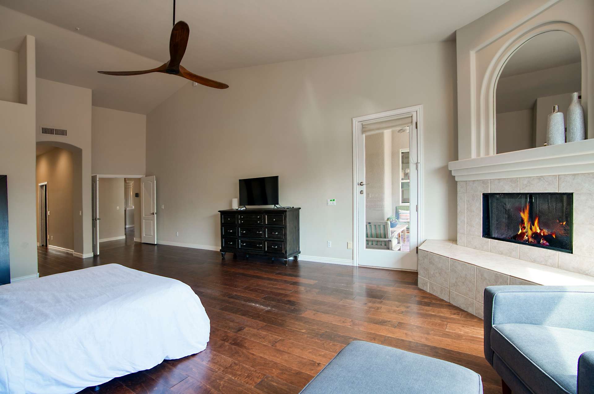 15 of 65. Unwind in your private suite with direct access to the backyard and a modern fireplace for ambiance. High ceilings and natural light elevate this tranquil, energy-efficient retreat.