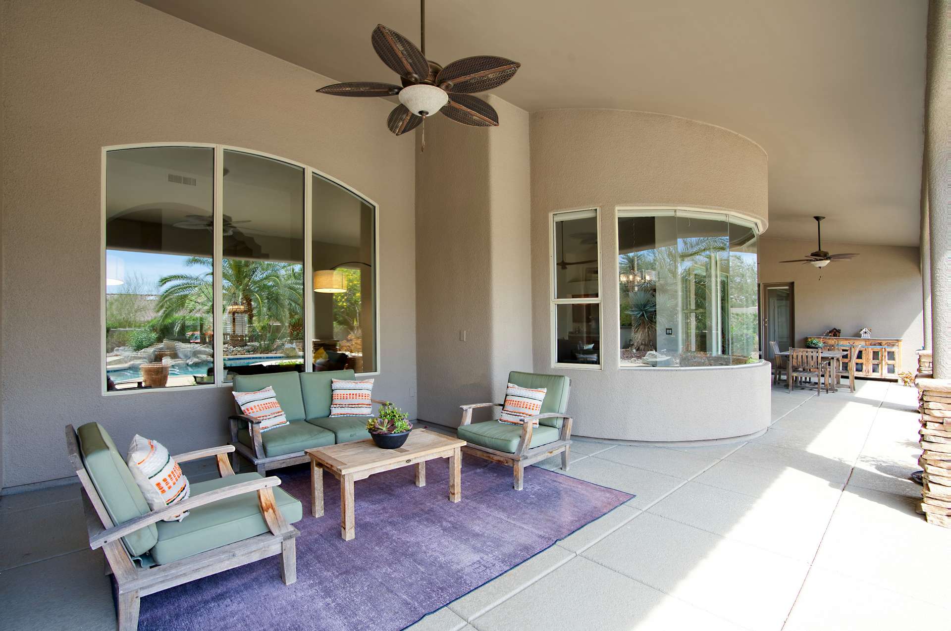 36 of 65. Relax in this tastefully furnished covered patio, offering plush seating and garden views. It s the ultimate shaded escape, enhancing the property s entertainment and comfort appeal.