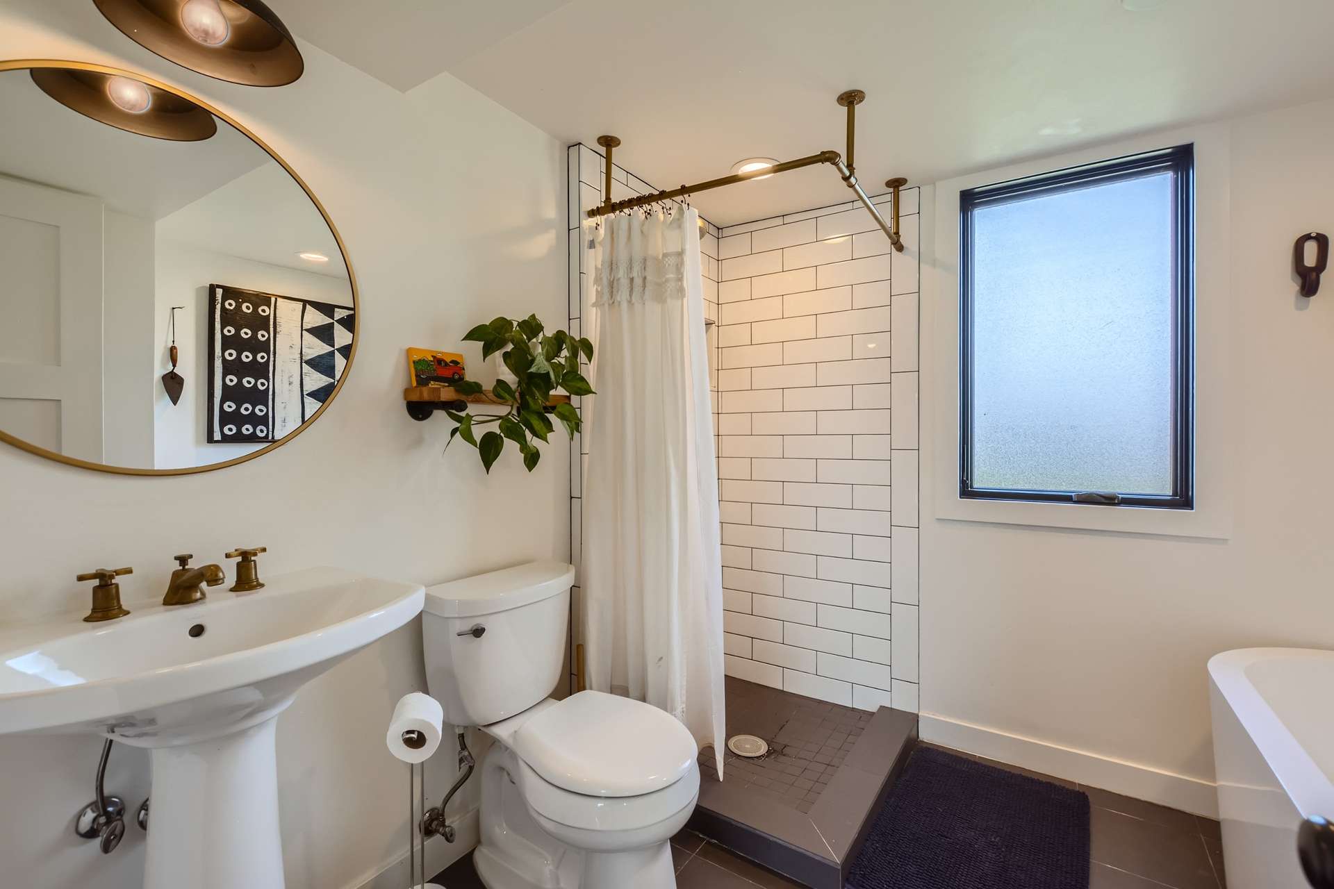 13 of 31. Lower Level Full Bathroom with Soaker Tub