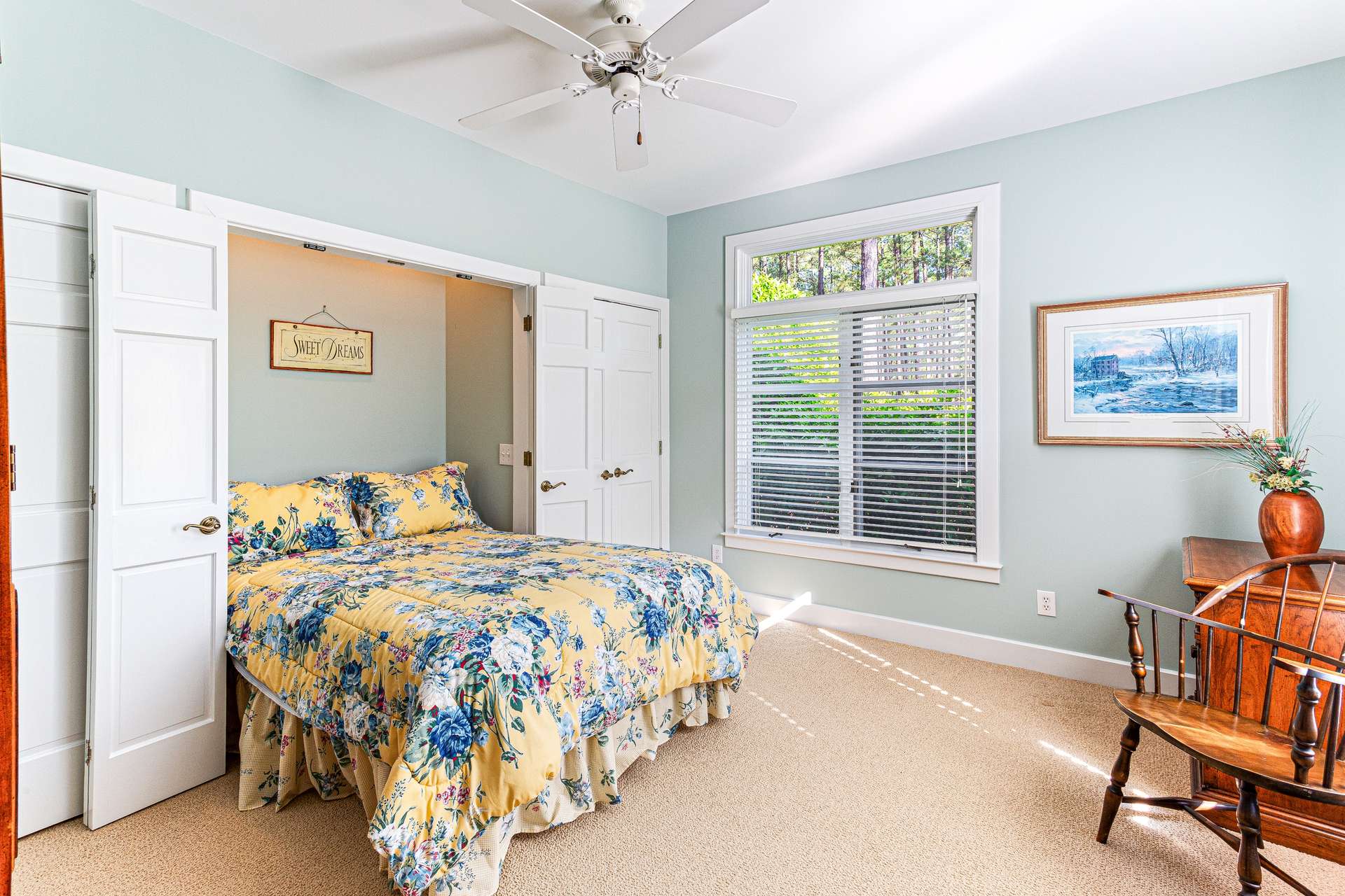 50 of 66. Bedroom with custom retractable wall bed can be used as office or den.