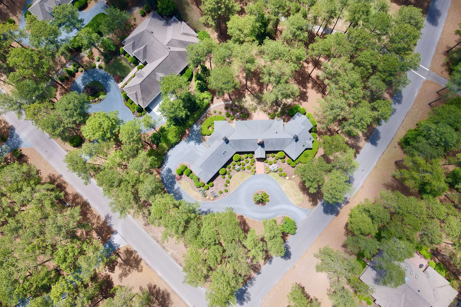 3 of 66. Spacious .89-acre corner lot overlooking 7th tee of Magnolia golf course.