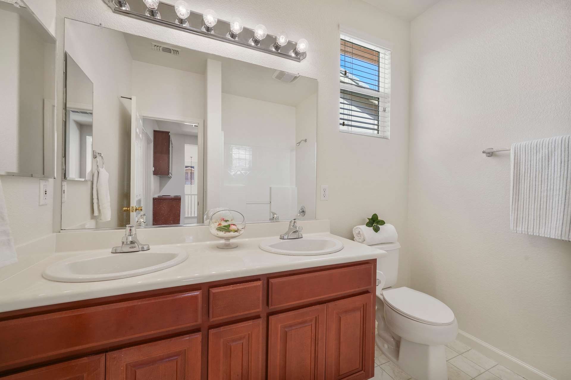 34 of 58. Upstairs Hall Bathroom; tub with overhead shower