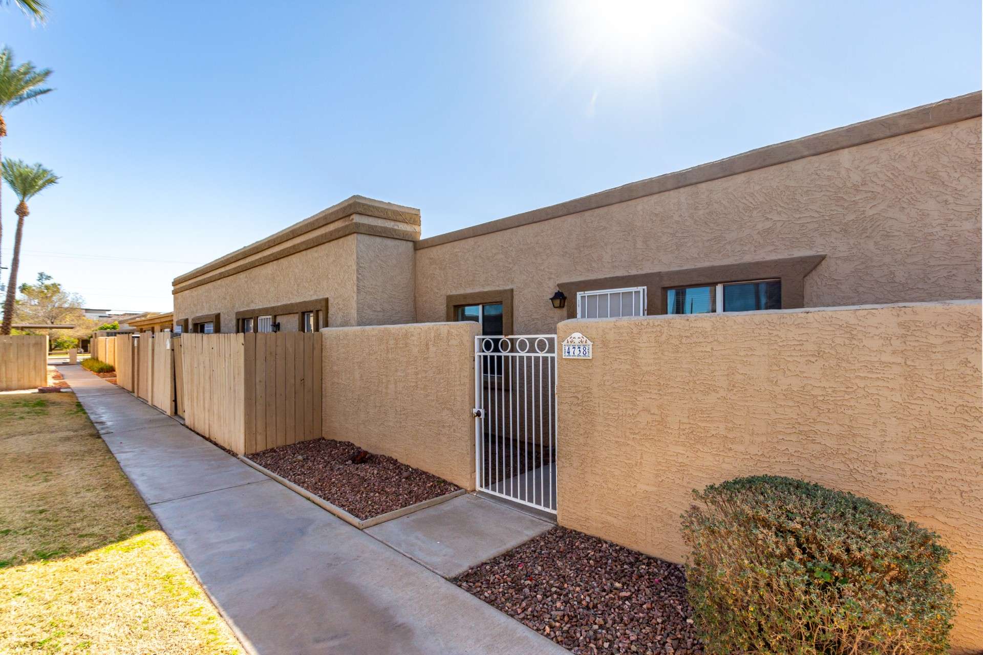 2 of 26. A secure gated entry welcomes you home to this cozy North Central Phoenix condo. The private front patio offers a low-maintenance outdoor space, ideal for relaxing. Enjoy the convenience of a quiet, well-maintained community with easy access to Midtown and Uptown Phoenix.