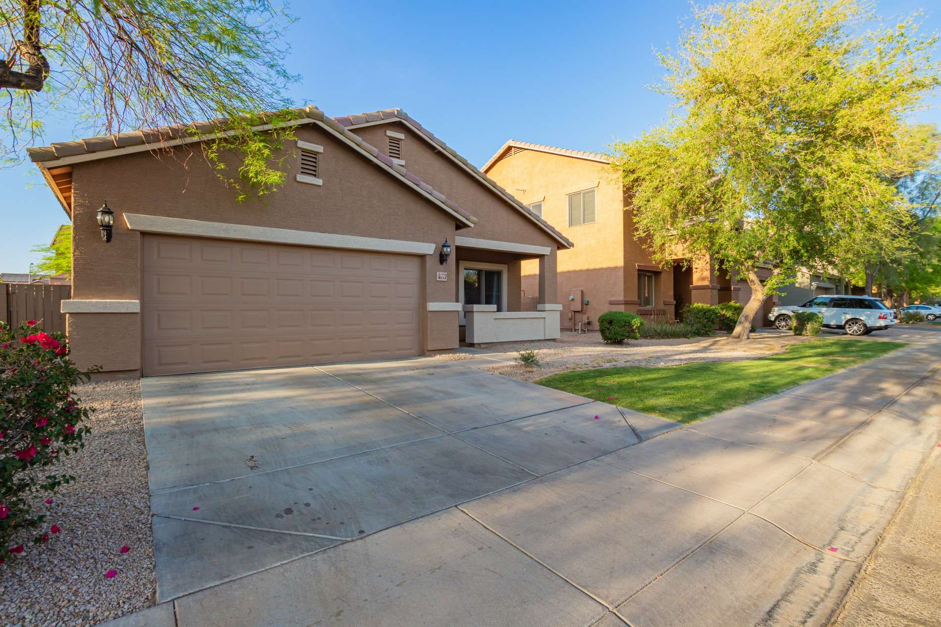 30 of 37. Enjoy the peaceful setting of this Rogers Ranch street, where tree-lined sidewalks and friendly neighbors define the lifestyle. The home s exterior blends seamlessly into the well-maintained community.