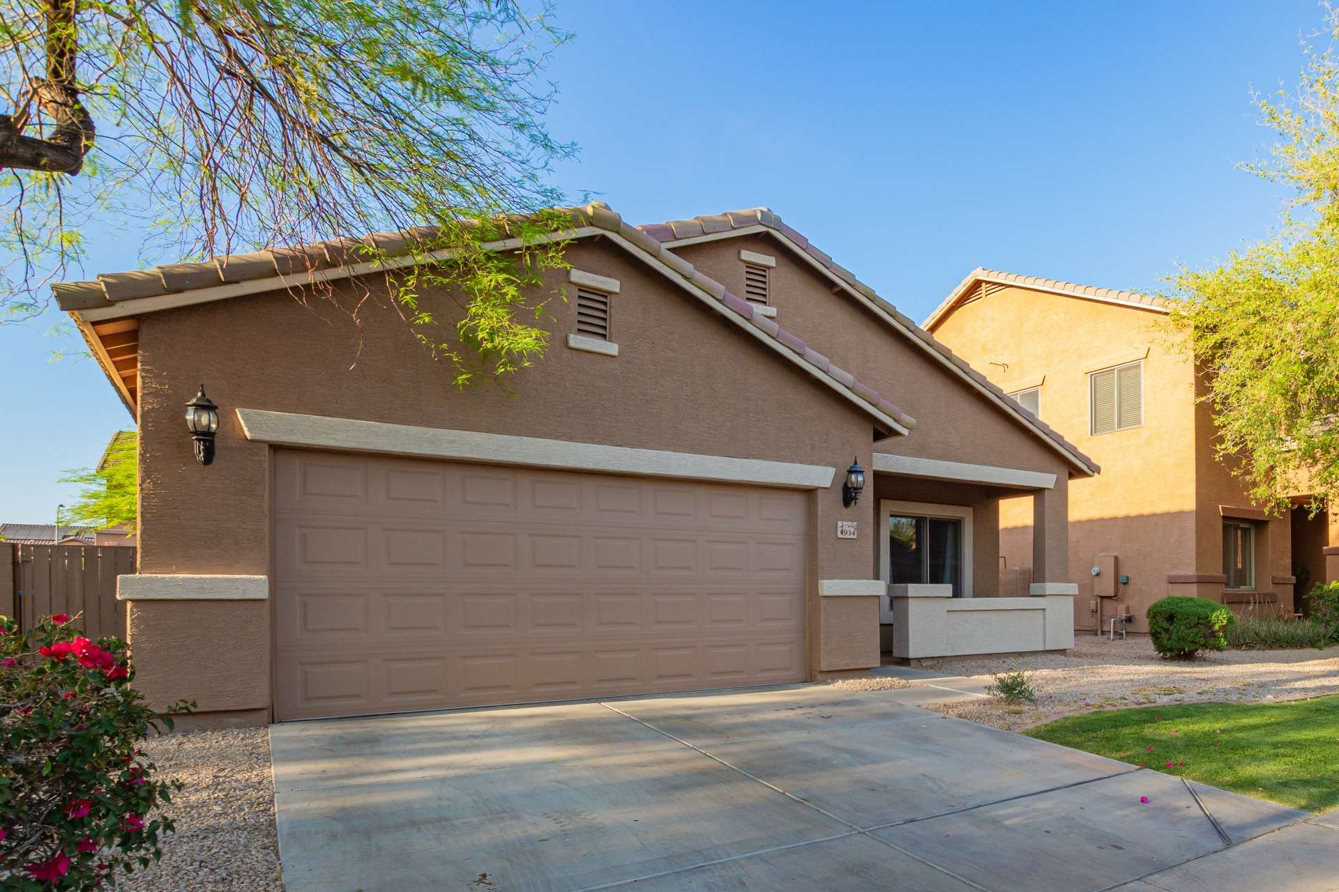 31 of 37. A wide concrete driveway and two-car garage provide convenience and extra storage. This energy-conscious home is perfect for buyers looking for low maintenance and ease of access in Laveen.