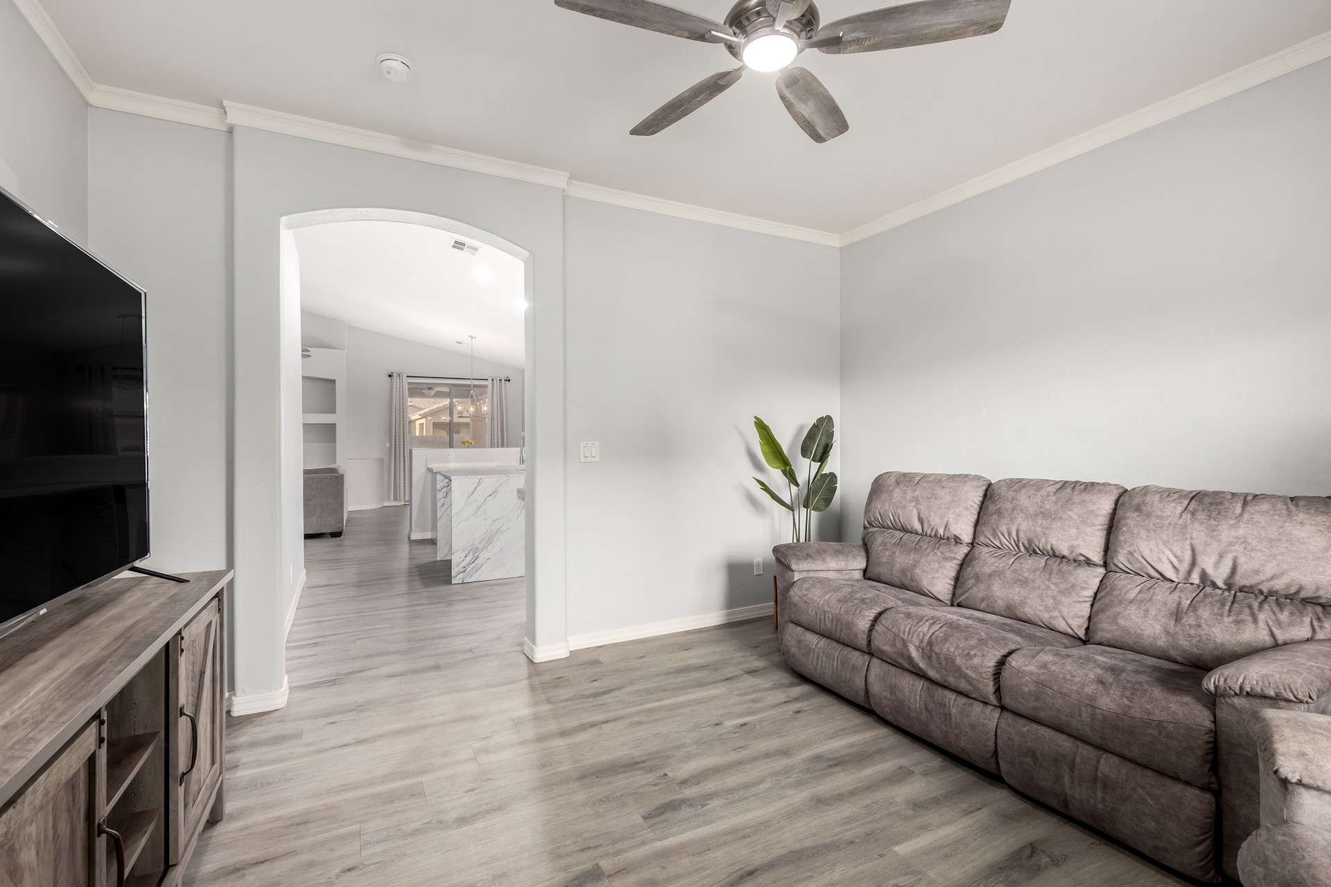 8 of 37. With a graceful archway leading into the heart of the home, this layout invites entertaining and easy movement. Stylish flooring and neutral colors offer a blank canvas for your personal style.