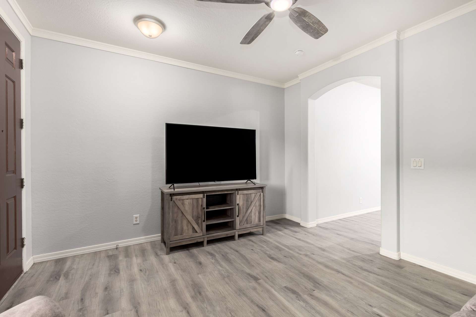 7 of 37. Use this versatile space as a second living room, media area, or home office. Clean lines, fresh paint, and sleek flooring make it both move-in ready and design-friendly.