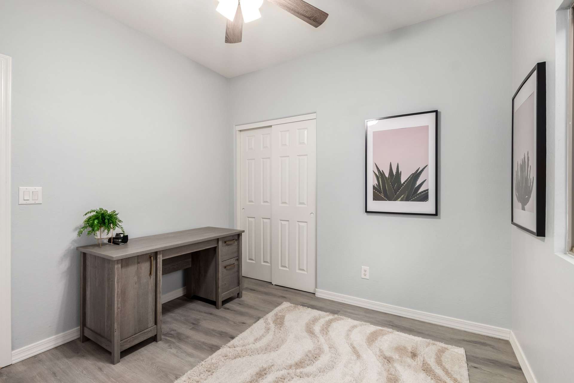 23 of 37. A charming wood sliding door adds privacy to this flexible office area. Ideal for remote work or hobbies, this room is tucked away for focus while still connected to the home s flow.