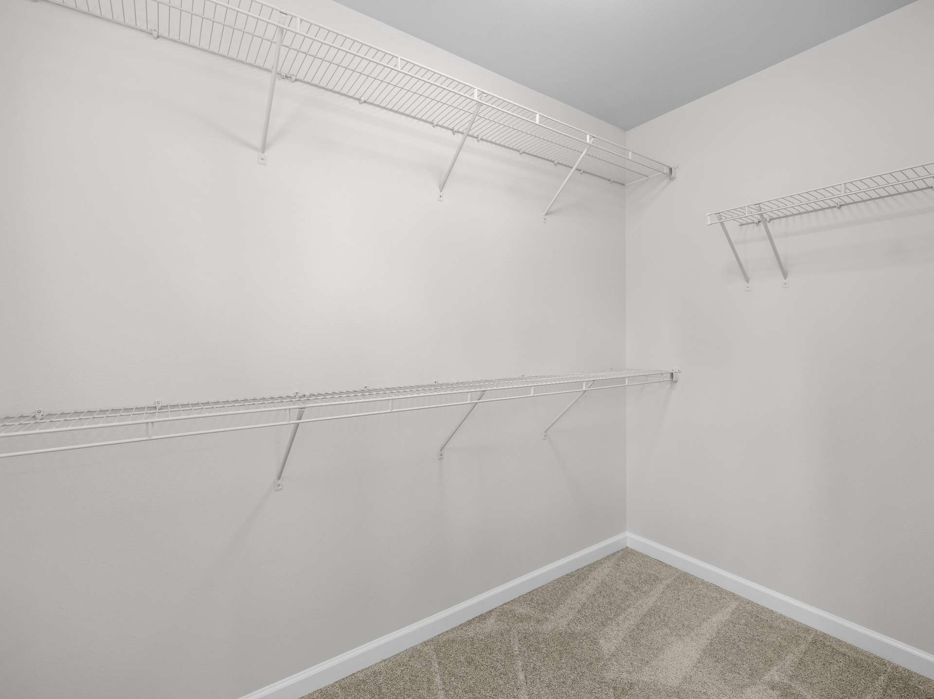 19 of 41. Primary Walk-In Closet