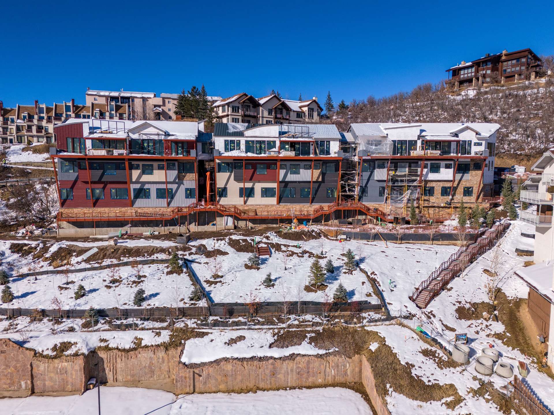 18 of 27. Walkway along the lower level and staircase to the right leads you down to Ski Time Square and access to the slopes