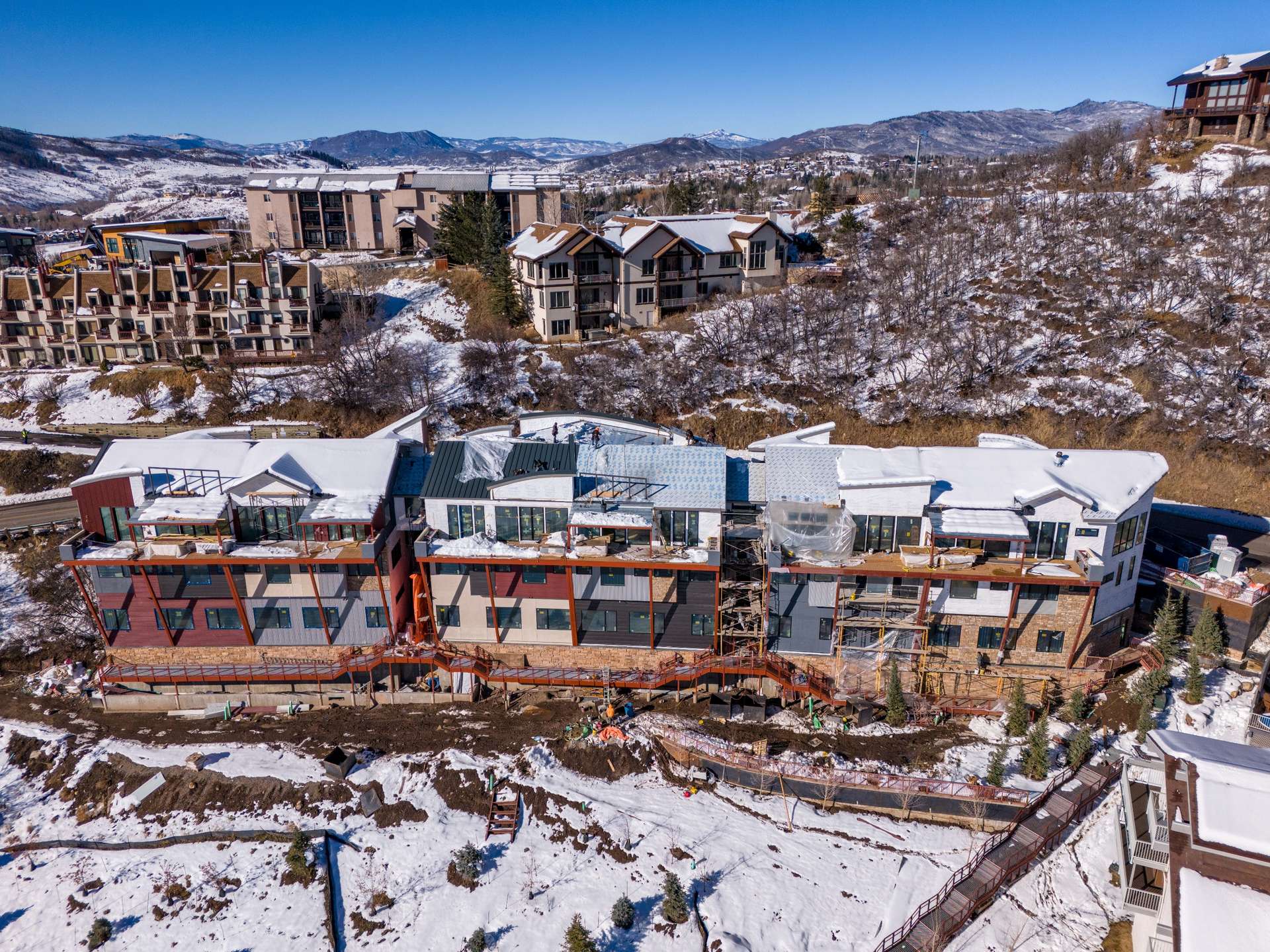 15 of 27. Snowy aerial view with a mountain view