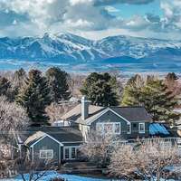 Welcome to this exceptional custom home in Niwot, offering privacy, natural beauty, and luxurious living in a serene setting with breathtaking views of open space and city lights.