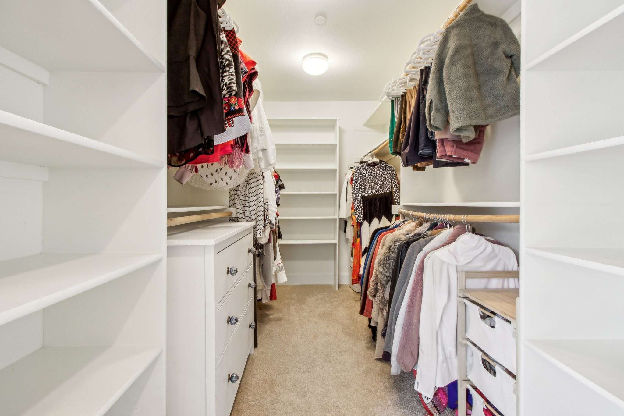 58 of 89. Primary En-Suite Walk-In Closet
