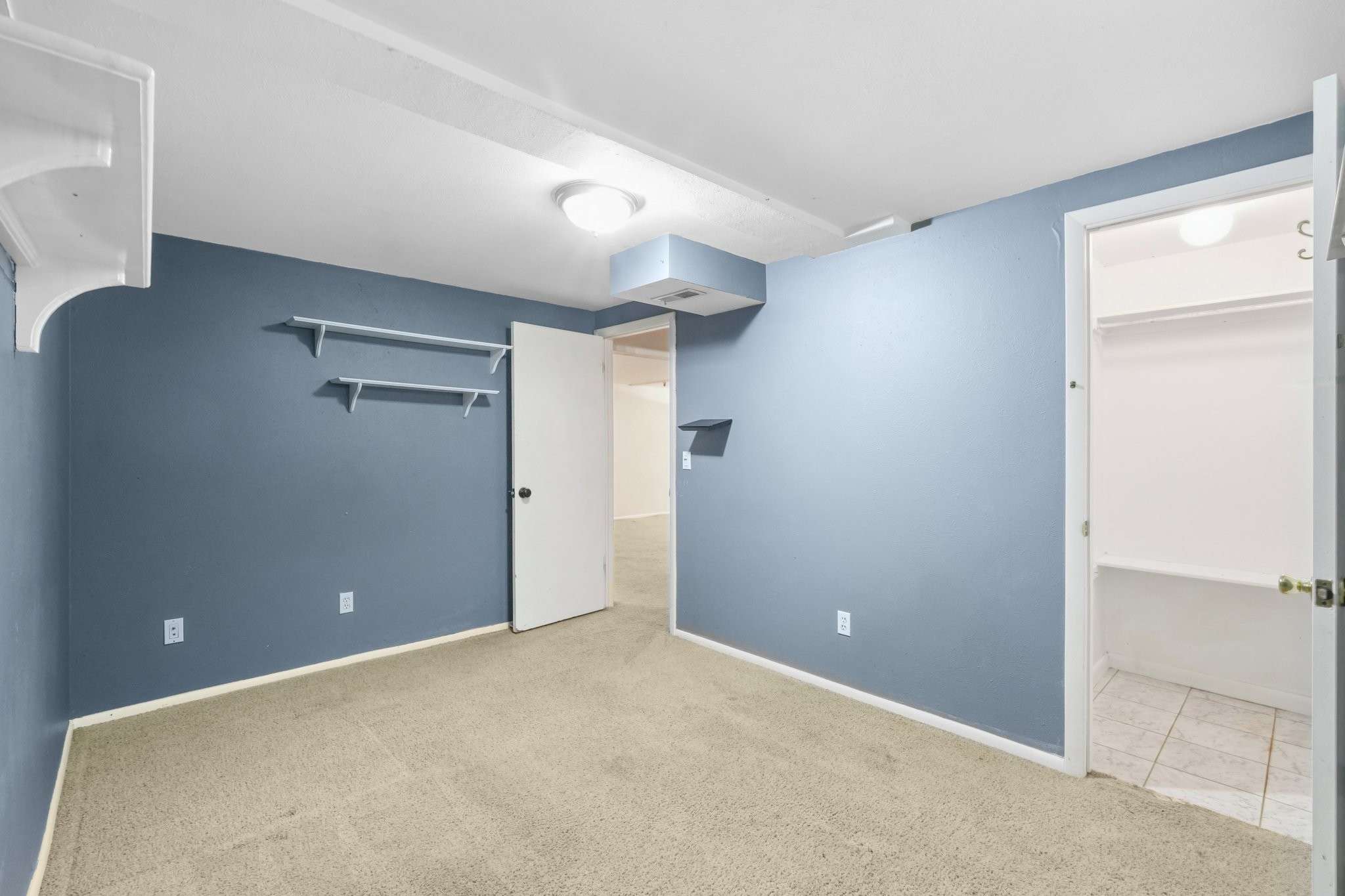 35 of 48. Basement bedroom 1
