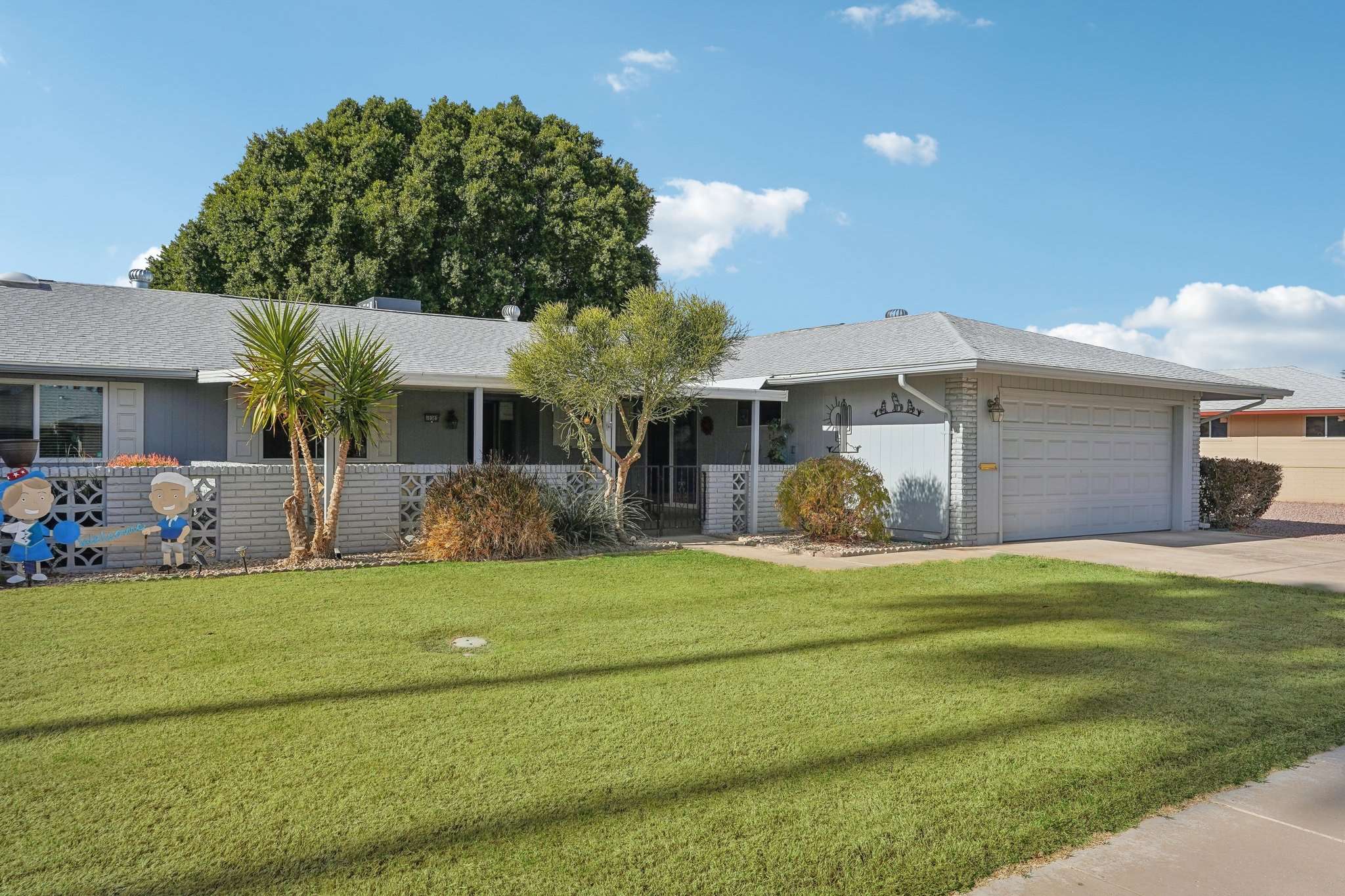 37 of 41. A covered front courtyard adds to this home's appealing exterior and cozy outdoor space. Enjoy a quiet, shaded retreat right at your doorstep, perfect for Arizona mornings or evening relaxation.