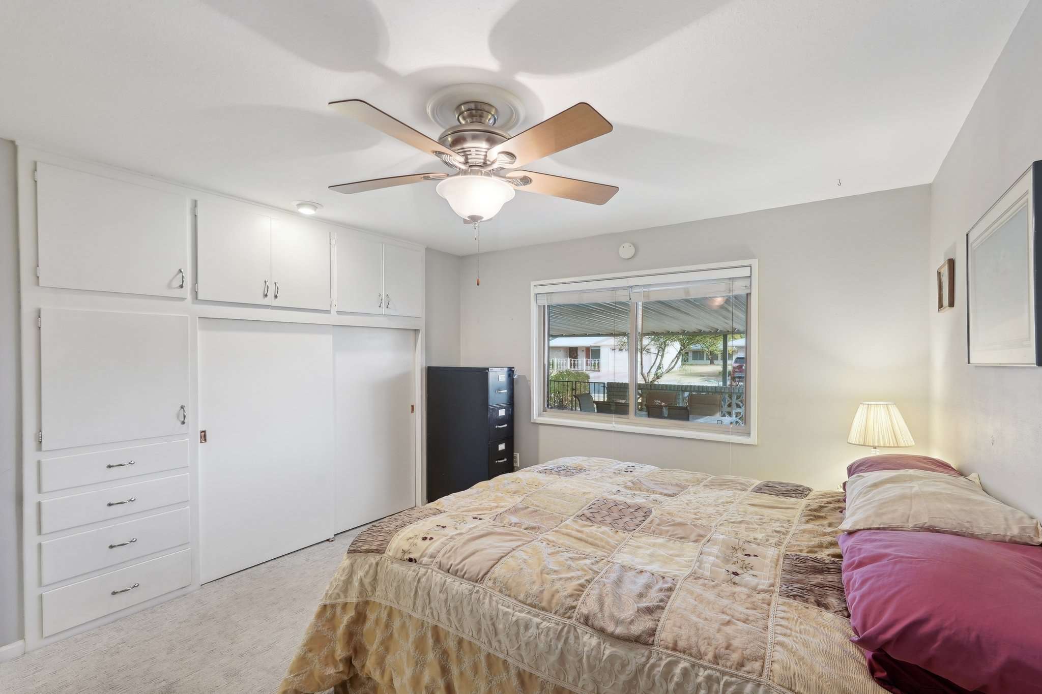 23 of 41. Enjoy ample built-in closet space in this bright and airy primary bedroom. The neutral color scheme and large window create a relaxing ambiance.