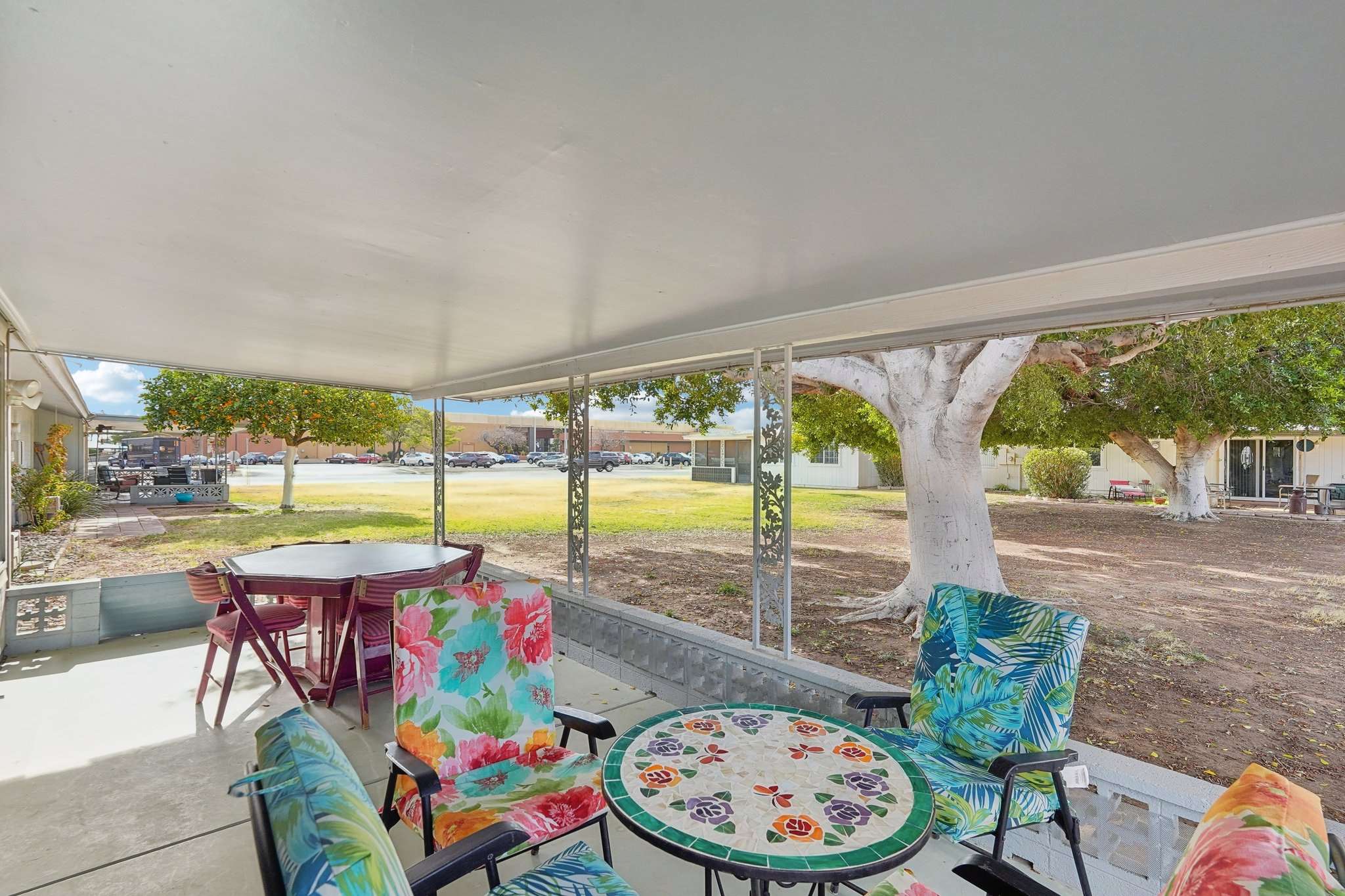 35 of 41. This screened-in back patio is the perfect setting for outdoor meals, reading, or entertaining guests, all while enjoying scenic backyard views.