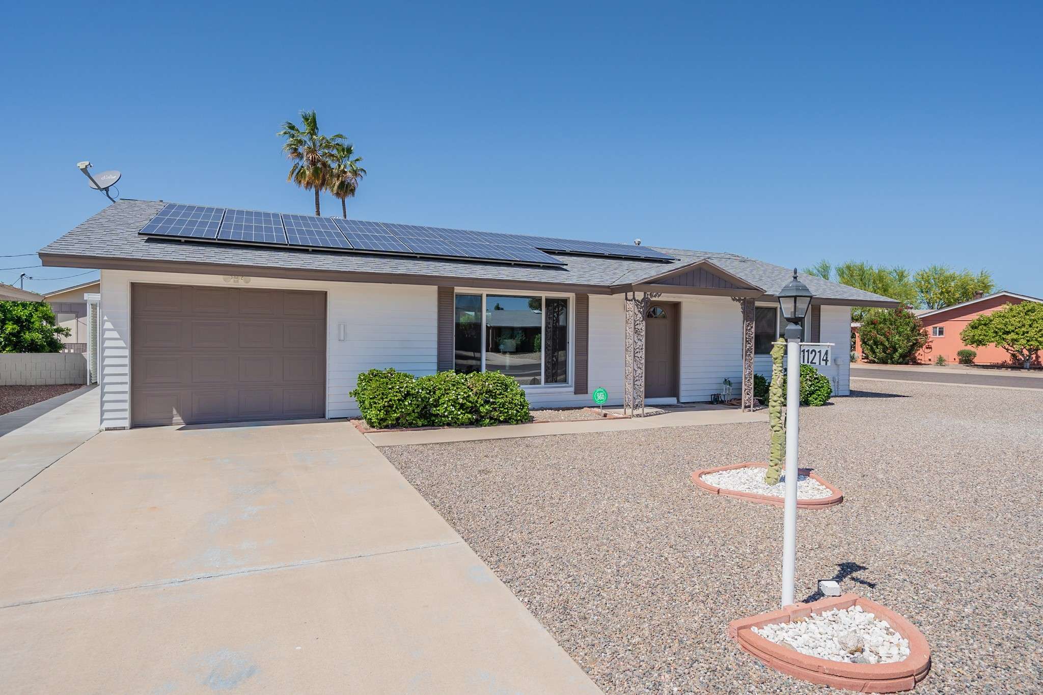 2 of 35. A low-maintenance, energy-efficient home featuring solar panels, updated windows, and a spacious driveway. Located in a prime 55+ community, this property offers modern upgrades with effortless upkeep.