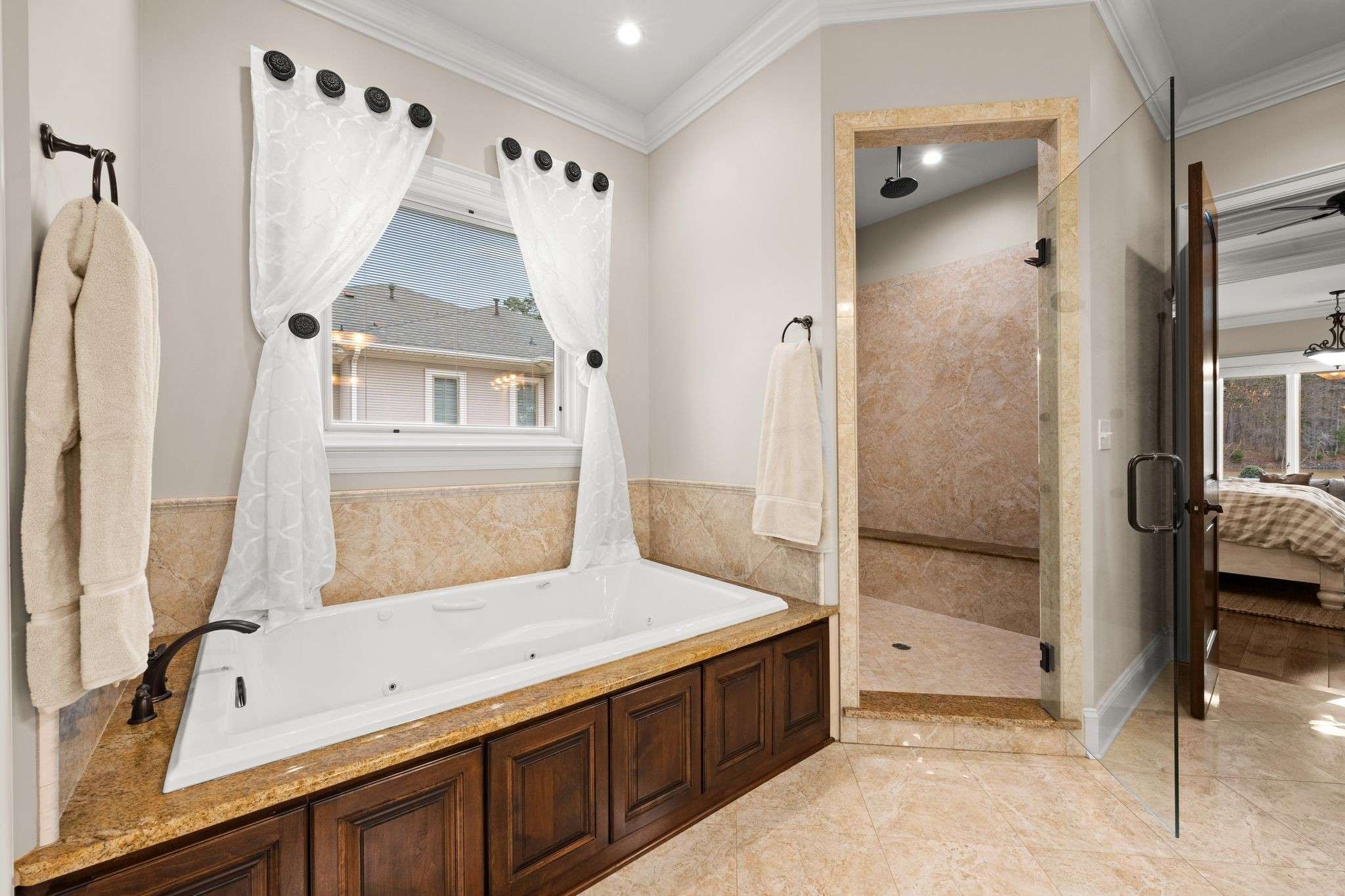 31 of 79. Interior Photo - 846 Armstrong Rd - Additional Photo of Primary Ensuite showing Spa Steam Shower, and Luxury soaking tub.