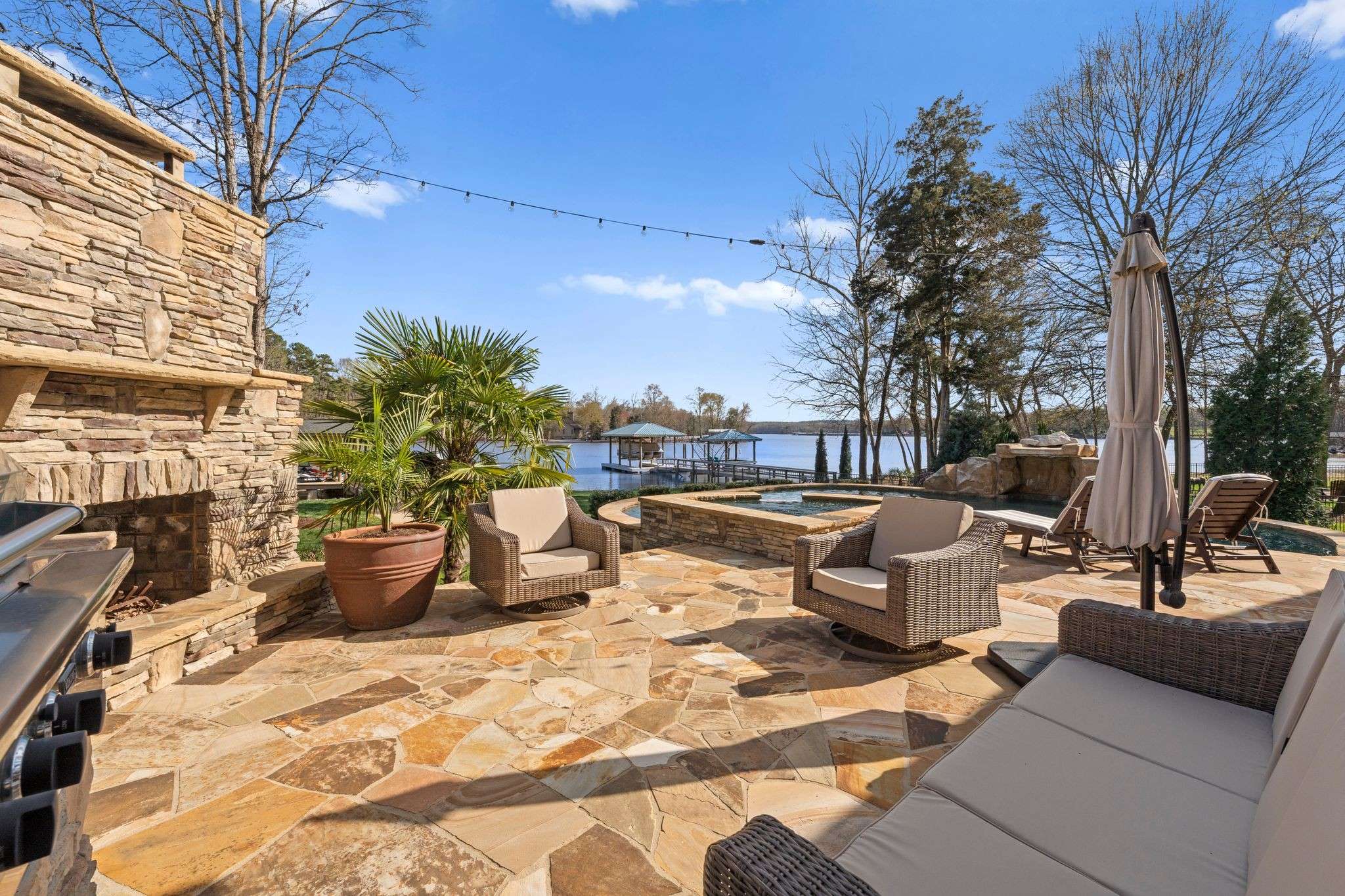54 of 79. Exterior Day Time Photo - 846 Armstrong Rd - Showcasing Additional View of Outdoor Living and Entertaining area with unobstructed views of Lake Wylie