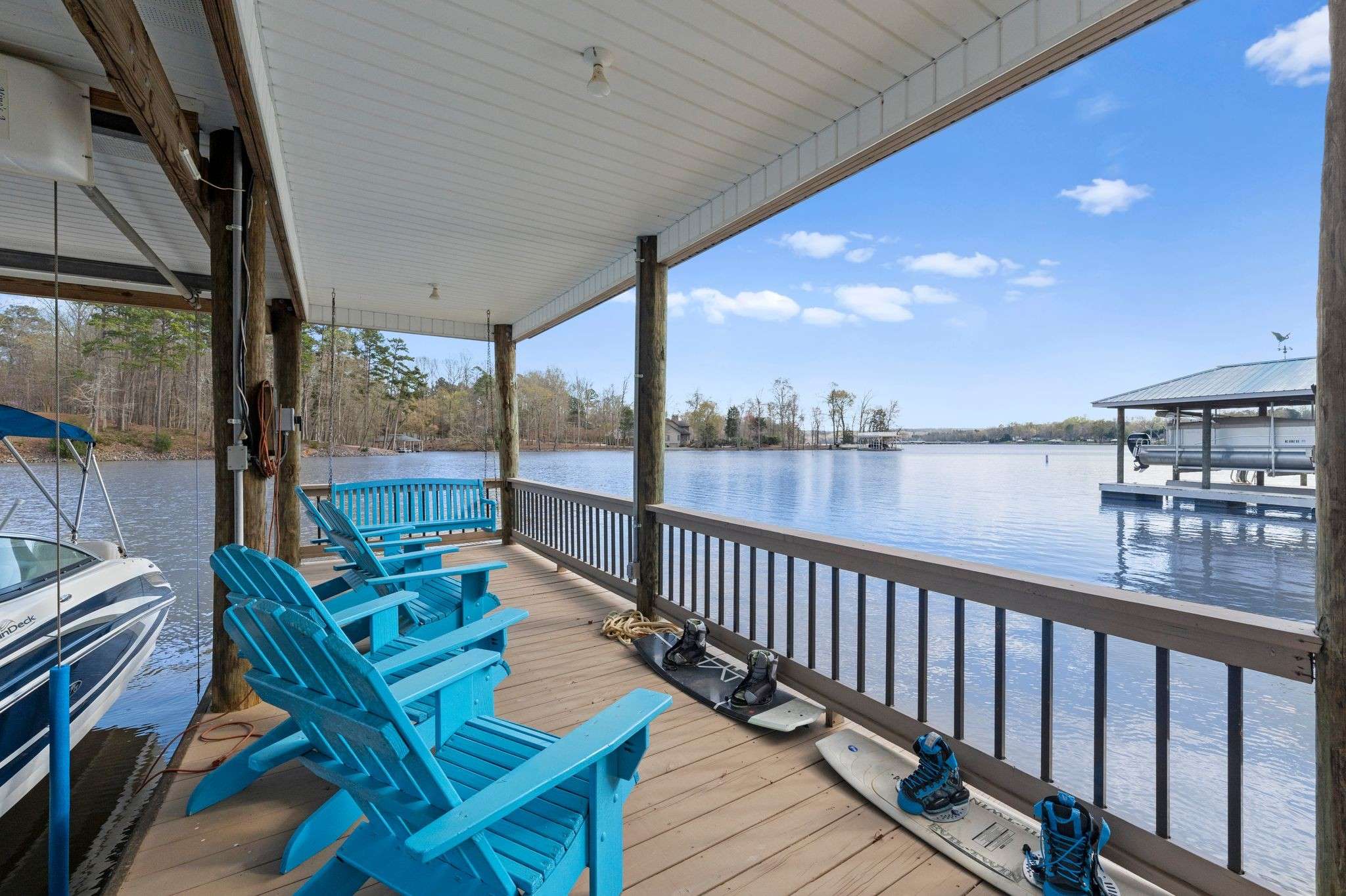 62 of 79. Exterior Day Time Photo - 846 Armstrong Rd - Showcasing View from Sitting area on Covered Dock.