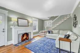 Step inside to a light and airy Living Room with a gas fireplace!