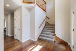 Beautiful Staircase Leads to the Upper Level