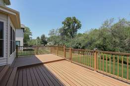 Spacious Deck Overlooking the Private Backyard