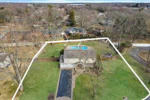 JUST LISTED! IN GROUND POOL & FULL BASEMENT!