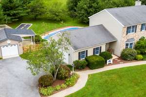 True Oasis With In-Ground Heated Pool Complex!