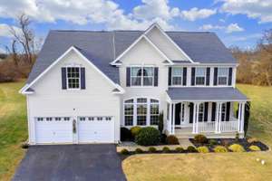 SOLD! Finished Walk-Out Basement PLUS Flat, Grassy Yards Backing to Woods!