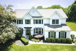 High-End Enhancements PLUS 2.5 Acres on a Park-Like Setting!