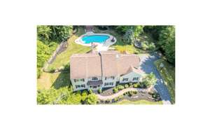Resort-Style Living on 1+ Acres PLUS Heated In-Ground Pool Complex! Downingtown East Schools!