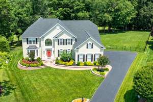 Luxury Living and Downingtown Schhols! Backs to Woods and Golf Course!