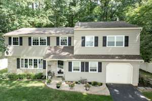 Custom Upgrades, Designer Styling, 2 Primary Suites --- PLUS a Parklike Setting!